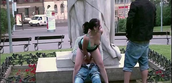  A cute chubby girl fucked by a famous statue in the center of the city in public